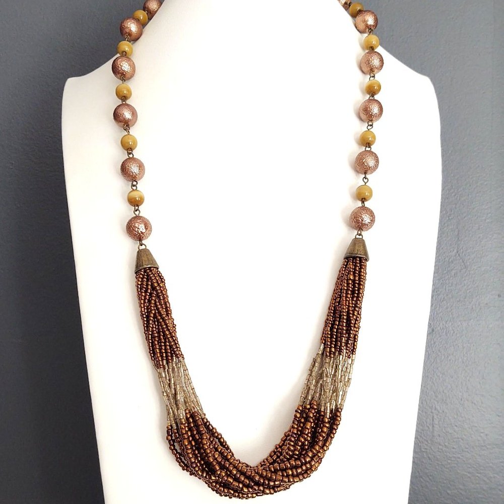 Bronze, tan, pale yellow and brass necklace